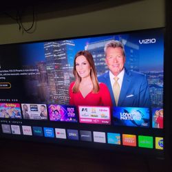 55inch VIZIO TV with optional wall mount