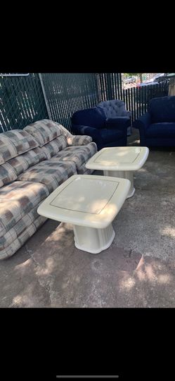 Couch and 2 end tables the couch is a recliner