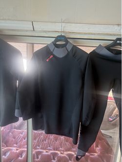Diving/surfing pants; provide warmth when in the water and feature antimicrobial properties. EXOWEAR top (men's), size L. Matching pants also availabl