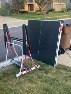 Free ping pong table with paddles and net