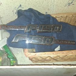 Two Ford Platinum Imbelems 
