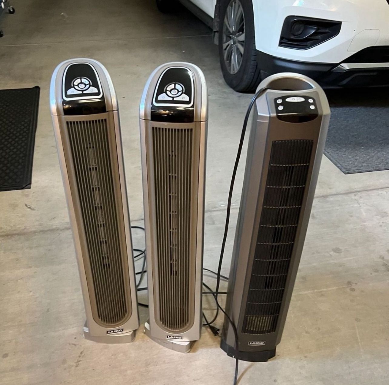 Three osculating floor tower heaters