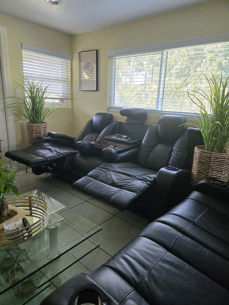Reclining  Leather Couch & Love Seat with Matching Carpet, Glass Multi Level Coffee Table and Computer Desk