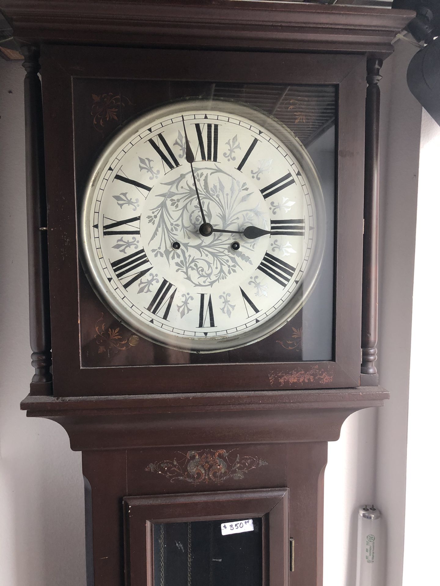 Antique weight drive grandfather clock