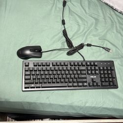 Asus Sagaris GK1100 mechanical gaming keyboard bundled with a wired mouse