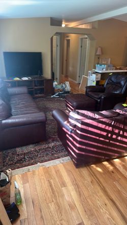 Leather sofa set. Includes sofa, love seat, lazy-boy & ottoman
