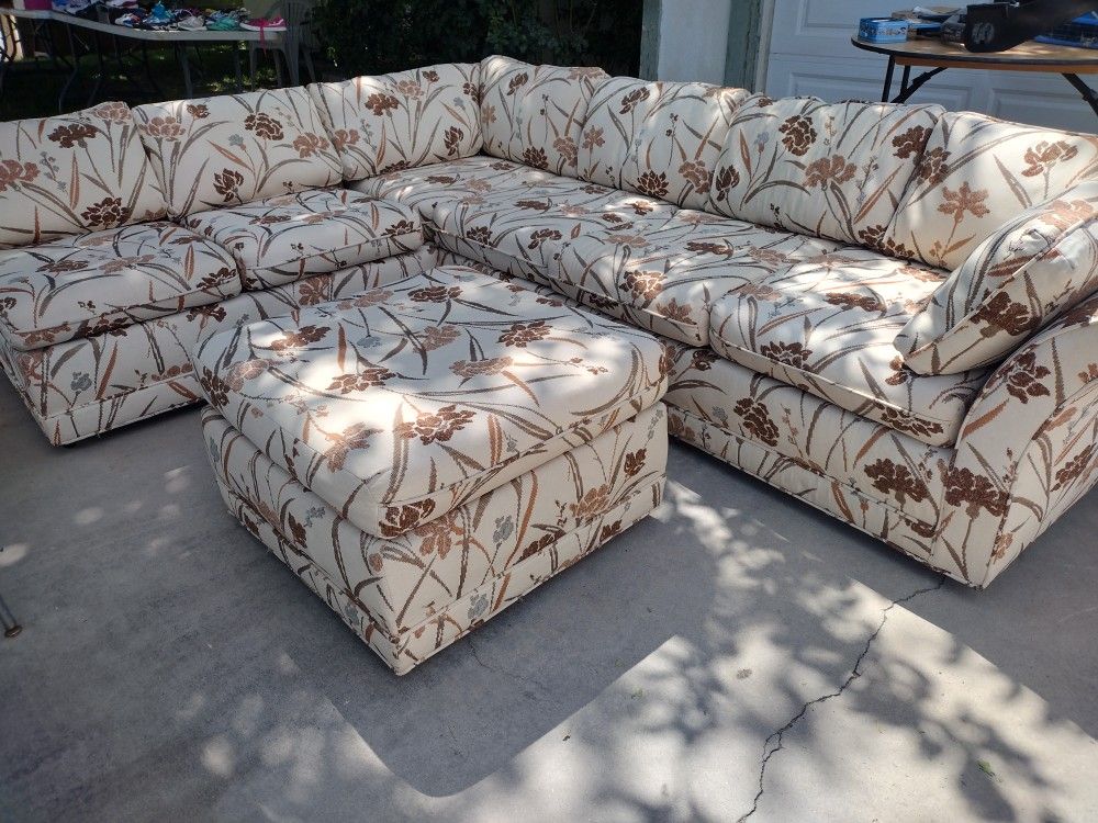 Sporty Looking Sectional Couch With Ottoman