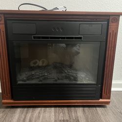 Electric fireplace with wood mantle