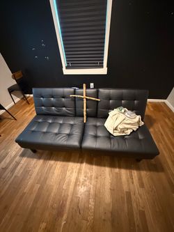 Black Faux Leather Tufted Futon Sofa