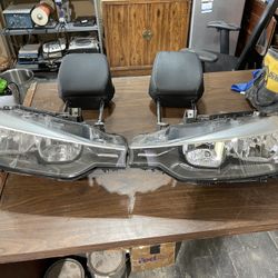 semi new bmw 325 headlight has not broken and headrest driver seat and ride