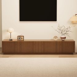 E956 $260  86.61" Mid-Century Modern TV Stand for TVs up to 85", Walnut Entertainment Console with Large Storage, Sturdy Media Cabinet for Living Room
