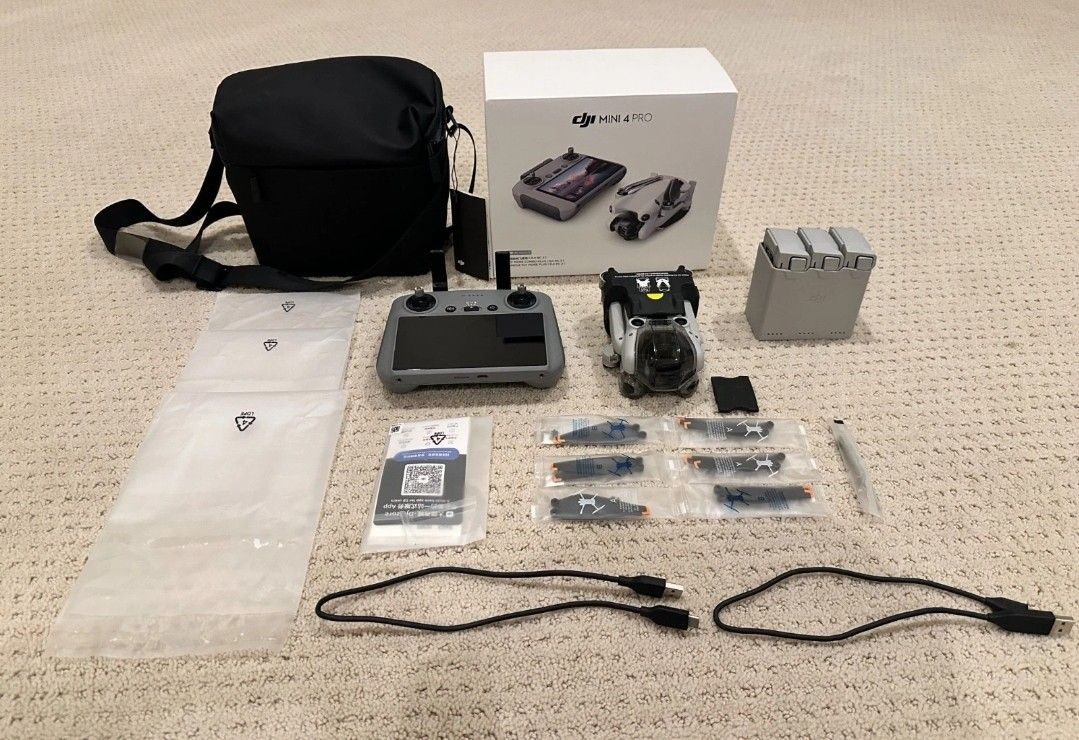 DJI Mini 4 Pro Fly More Combo Camera Drone (with RC 2 Remote)