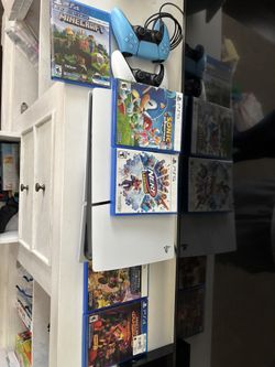 PS5 With 5 Games 2 Controllers/ Only 4 Months Old