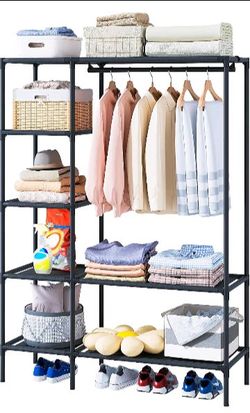 Metal Garment Rack with Shelves ( Brand New, Never Used ) For $30