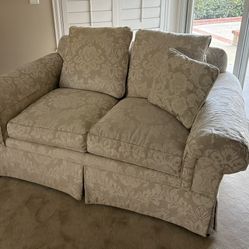8' cream color sofa and love seat