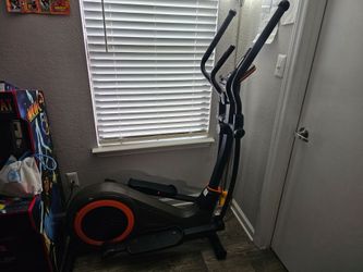 Black and Orange Home Elliptical Machine