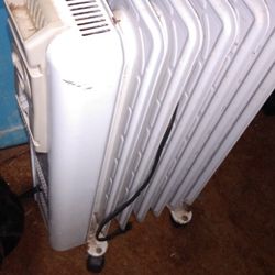 Heater, radiator style heater electric space, 1500 watt plus, works great