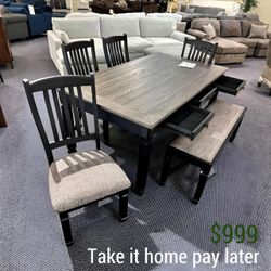 "Elegant Design in Black and Gray: Tyler Creek Dining Set"