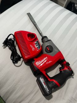 M12 FUEL 5/8” SDS Plus Rotary Hammer with Milwaukee M12 12V Lithium-Ion XC High Output 5.0 Ah Battery & Charger