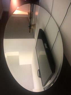 Large oval wall mirror