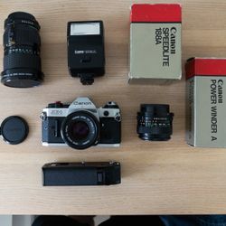 Canon AE-1 Program Film Camera Bundle – Lenses + Winder ($550 OBO)