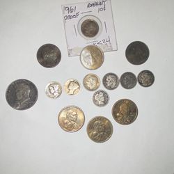 8 silver dimes a 1964 Kennedy and 3 Sacagawea coins with error and the rest quar