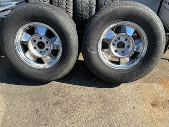 Two 16” Chevy 6 lug wheels and tires