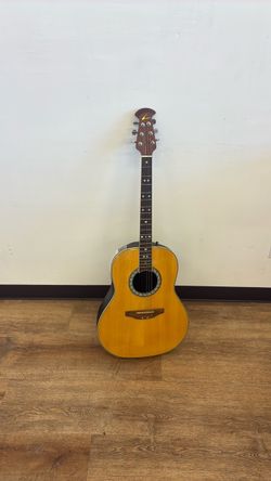 Acoustic Guitar with Round Back Body