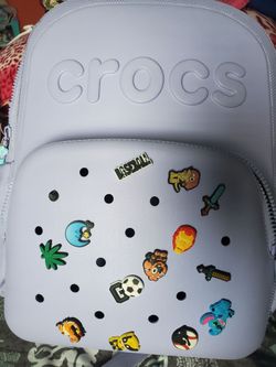 Purple crocs backpack with charms
