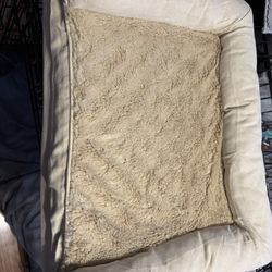 Small Tan dog bed. Unzips to clean. Never used. Pet bed 