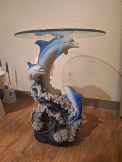 Dolphin Glass top end table $300 O.B.O.