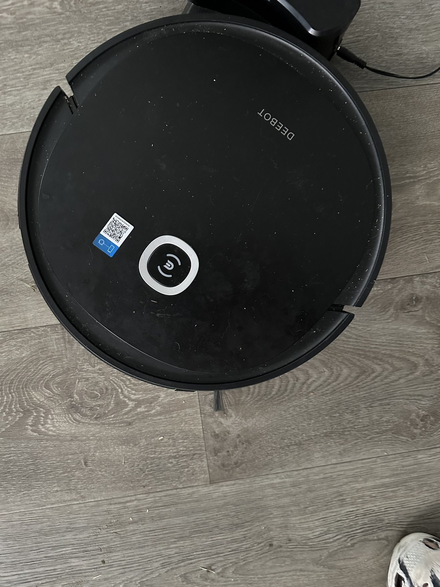 Black Roomba with charger