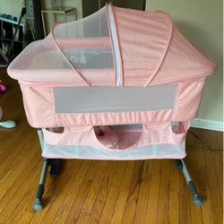 Pink bassinet 