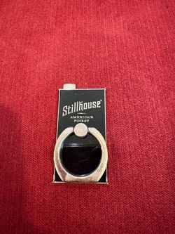 Never Used Stillhouse Whiskey Flask Style Metal Phone Grip Stand-Black/ Silver