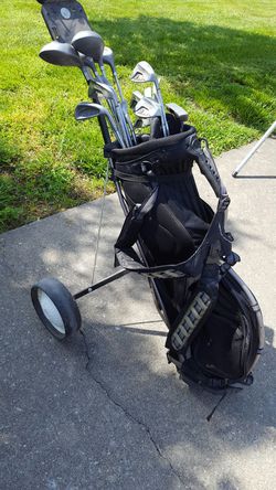 Golf clubs and bag and carrier
