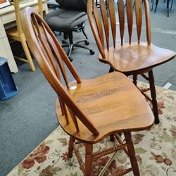 Two wood farmhouse stools with backrests