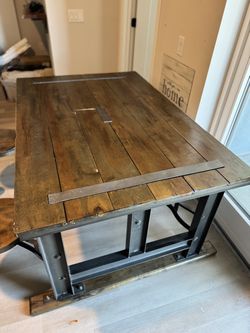 Wood and iron dinner table