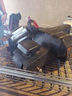 Saw And a black Decker sander belt device