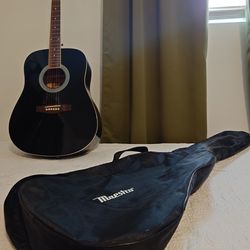 Black Acoustic Gibson Guitar