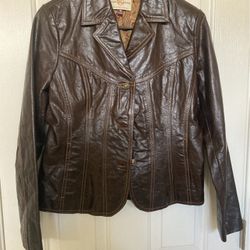Vintage women’s dark brown leather jacket