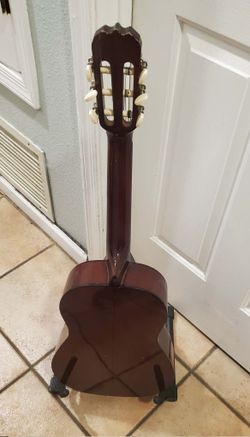 Beginner guitar and guitar stand