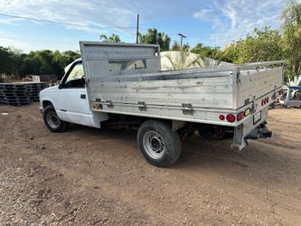 GMC truck 1997 with aluminum flatbed and foldable sides