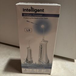 Brand New in sealed package not opened portable Water Flosser.4 cleaning modes. 4 nozzles included 