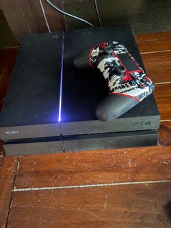 Sony PS4 Console with Controller and 3 games. Like new.