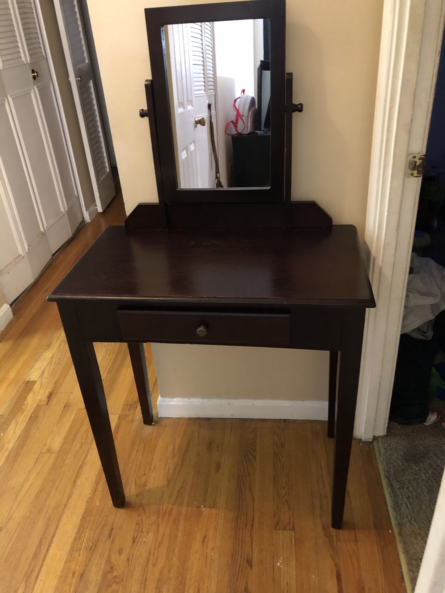 Cherry wood vanity set with attached mirror and pull out drawer. Excellent condition. Will sell with bench seat (needs a couple screws in one leg) I
