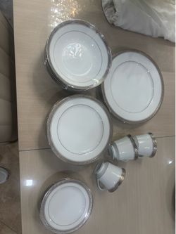 Fine porcelainChina set. Very lightly used. Almost looks new