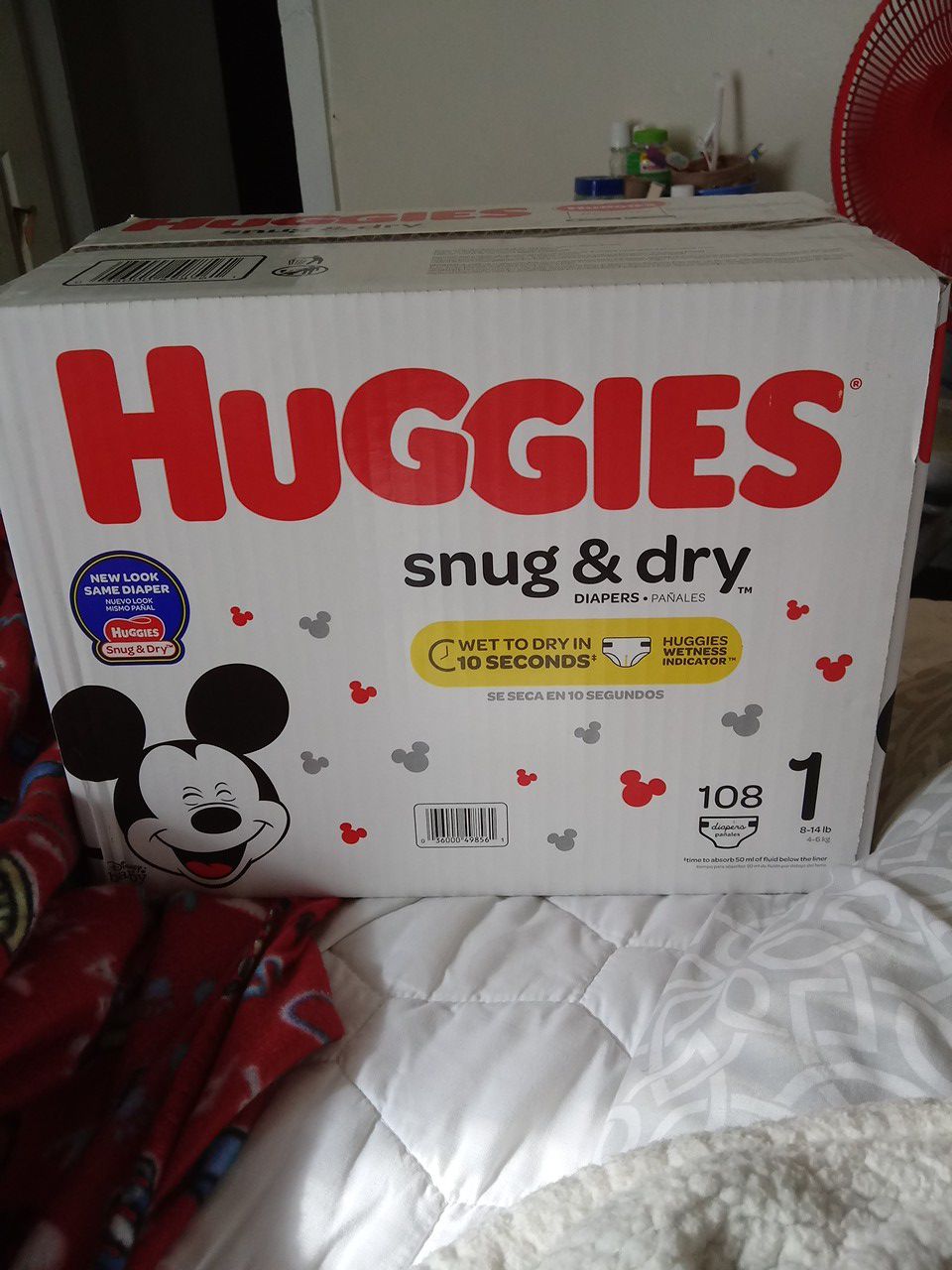 Infant huggie diapers