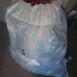 A Bag Full Of Women's Clothes.