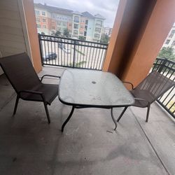 Used Patio Table And 2 Chairs 