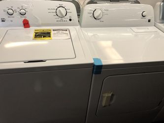 New scratch and dent Kenmore High Efficiency washer and dryer set. 1 year warranty